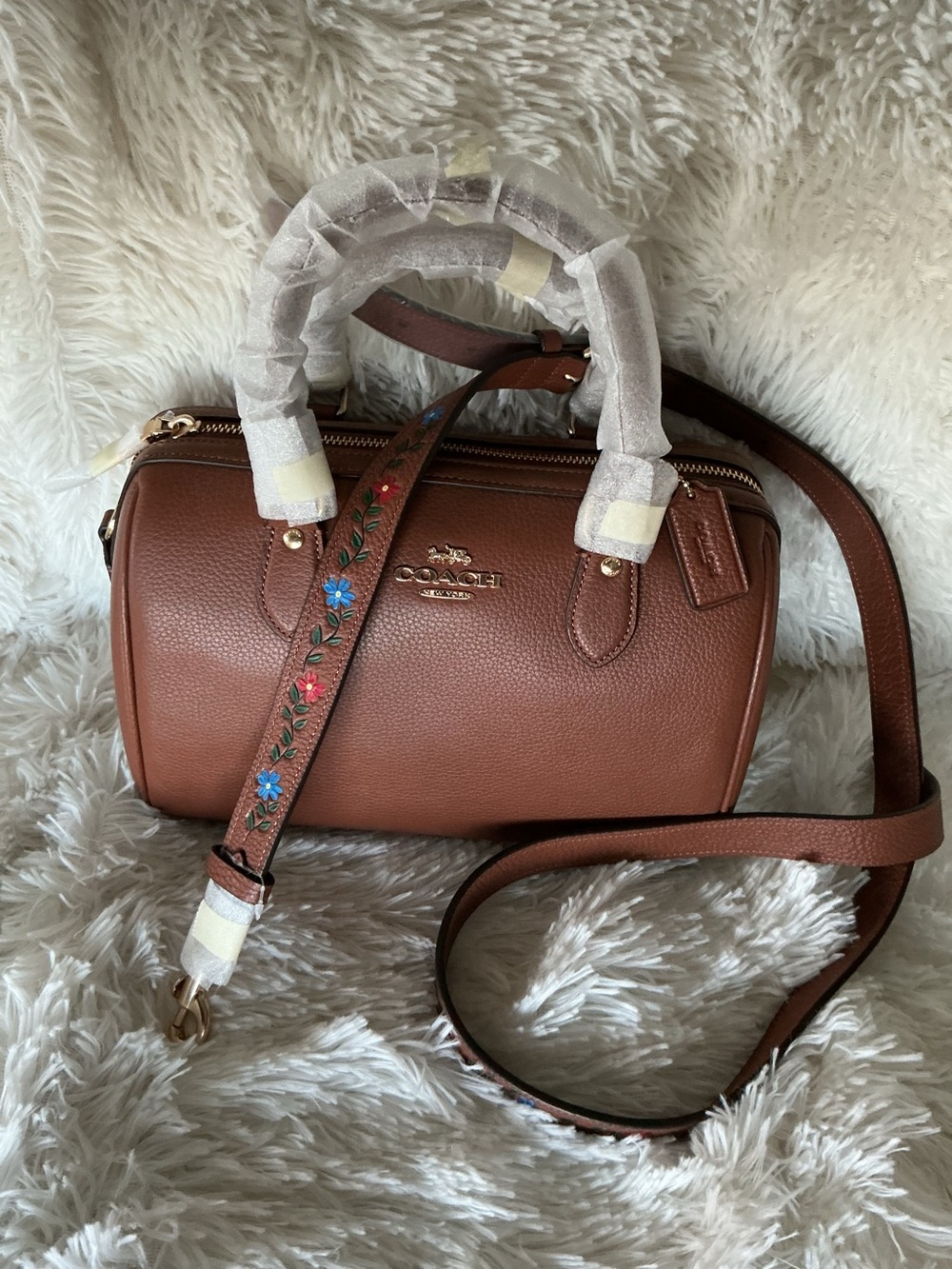 Coach Leather Rowan Satchel in the color redwood multi with Floral Strap